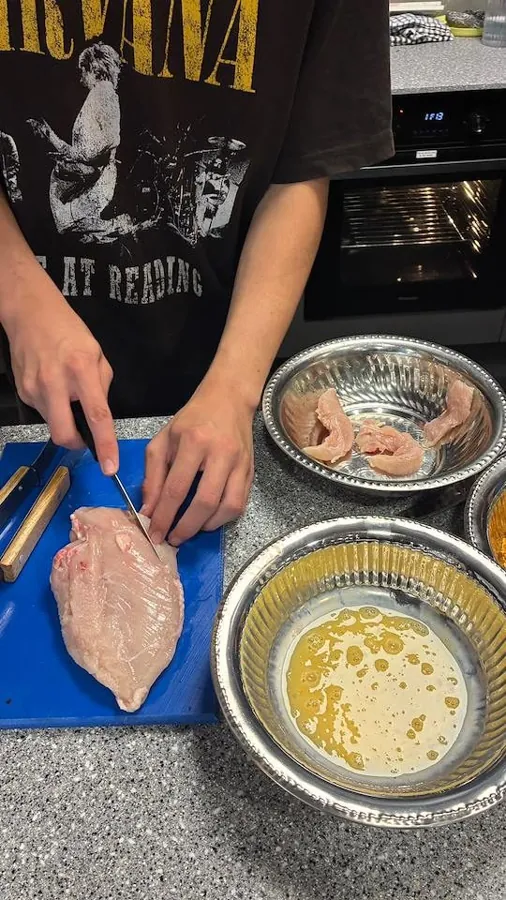Preparing chicken to cook