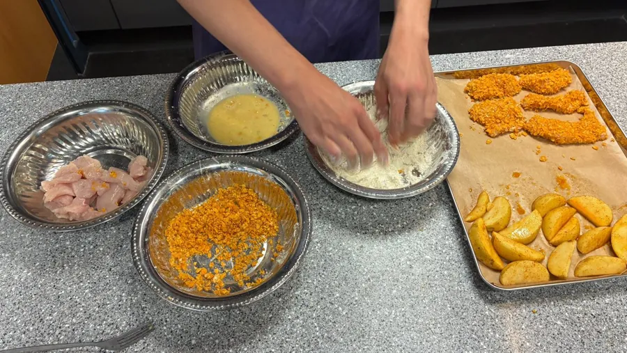 Coating chicken pieces before baking